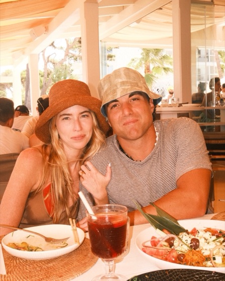 Nick and Erin at lunch by the sea